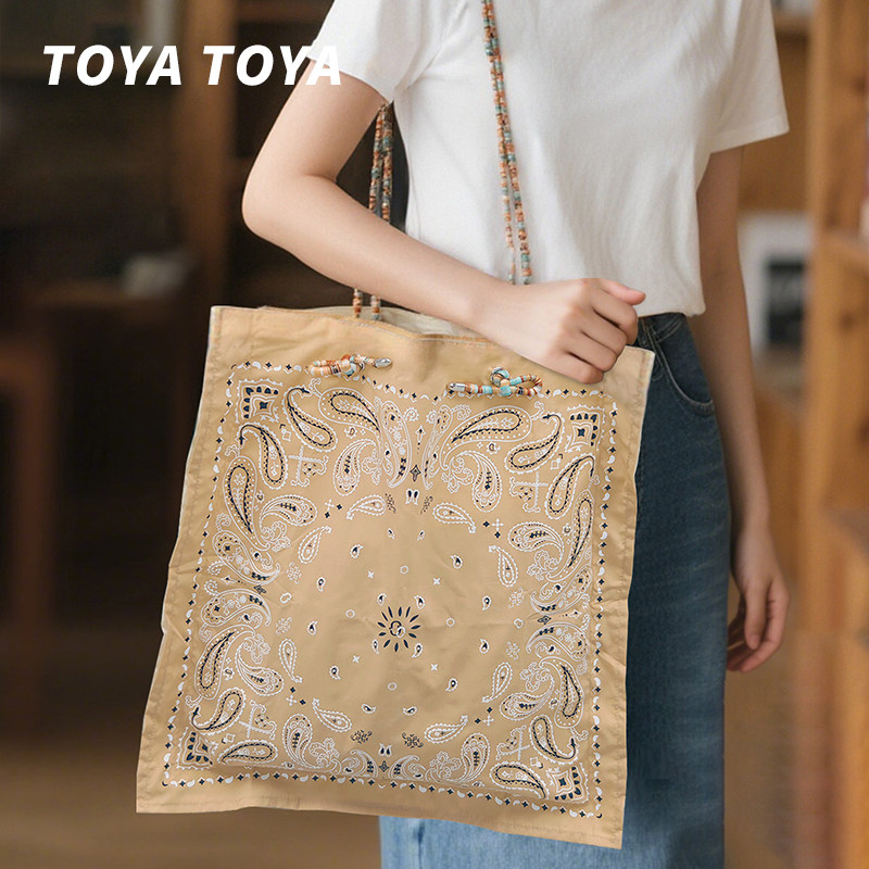 TOYATOYA民族风腰果花帆布包度假风出游斜挎