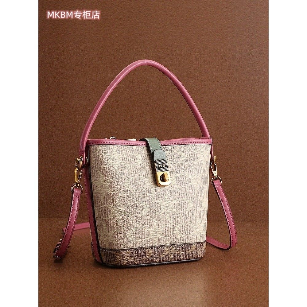 法国DUDK轻奢高级真皮覆古水桶包女新款流行小众单肩斜挎包手提包,箱包皮具/热销女包/男包,水桶包,淘宝优惠券,粉丝福利购,淘宝优惠卷