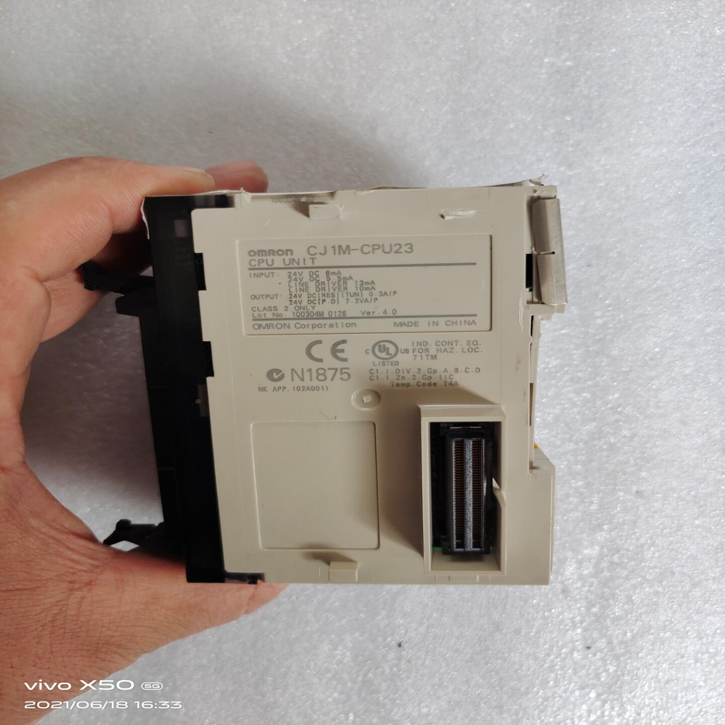 OMRON CJ1W-CPU23实物现拍成色如图.外壳破了.~议价
