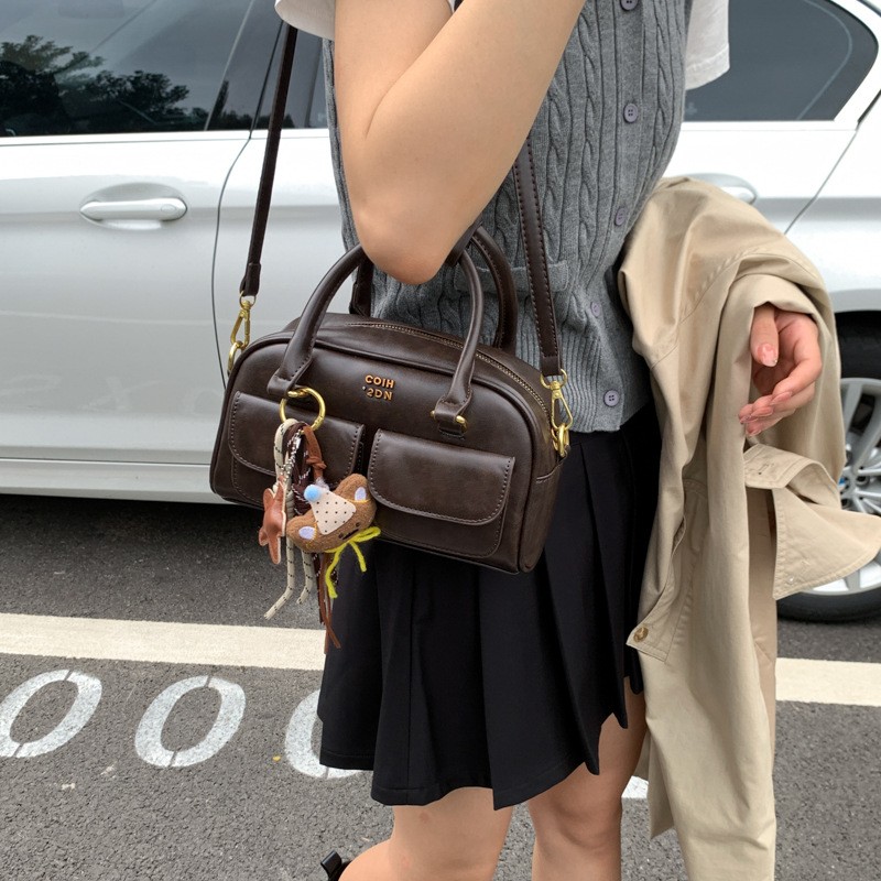 复古美拉德风手提包女士包包2025新款简约保龄球包单肩斜挎小方包
