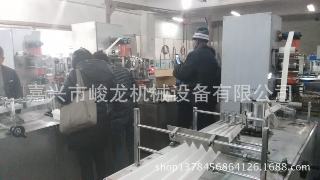 峻龙全自动航空竖行纸巾机