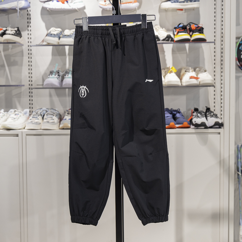 李宁正品2025新款篮球系列男大童速干宽松运动束脚长裤YYKV003-2