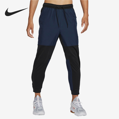 Nike/耐克正品新款男子复古拼接运动梭织工装收腿长裤FB8602