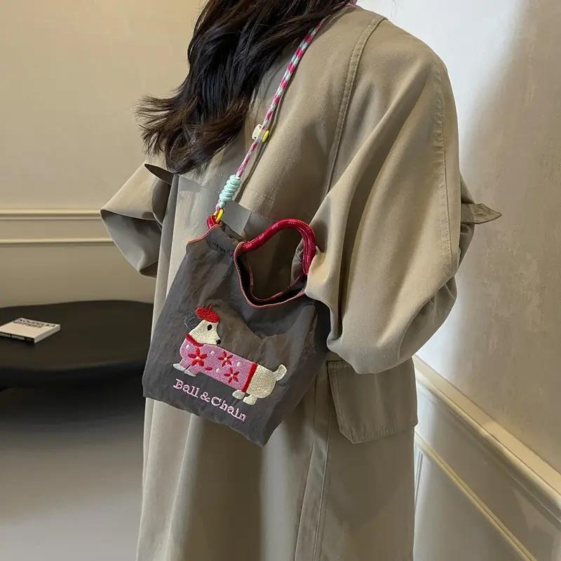可爱腊肠狗水桶包包女日系刺绣手机包迷你手提袋儿童单肩斜挎小包