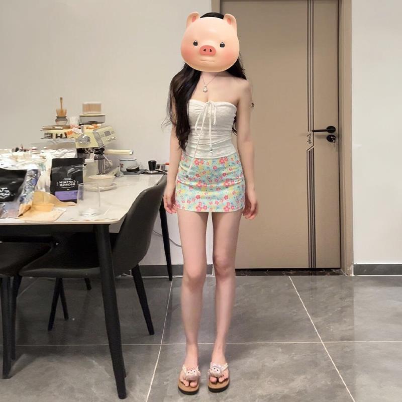 碎花短裙油画半身裙女夏2025新款小个子a字包臀裙绝美多巴胺裙子
