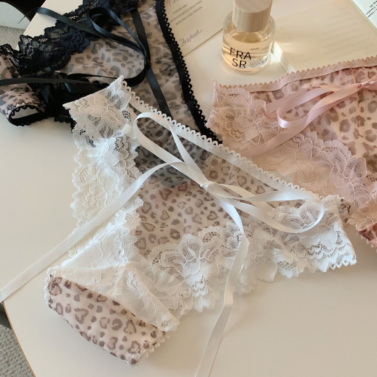 妖精系带～内裤女蕾丝网纱蝴蝶结后臀大镂空系带甜美女士三角裤