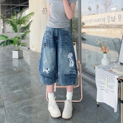 设计感小狗印花弯刀牛仔七分裤
