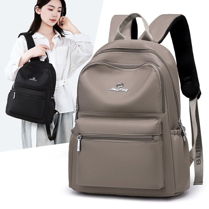 简约防水双肩包女包大容量轻便通勤书包休闲旅行小背包大学生书包