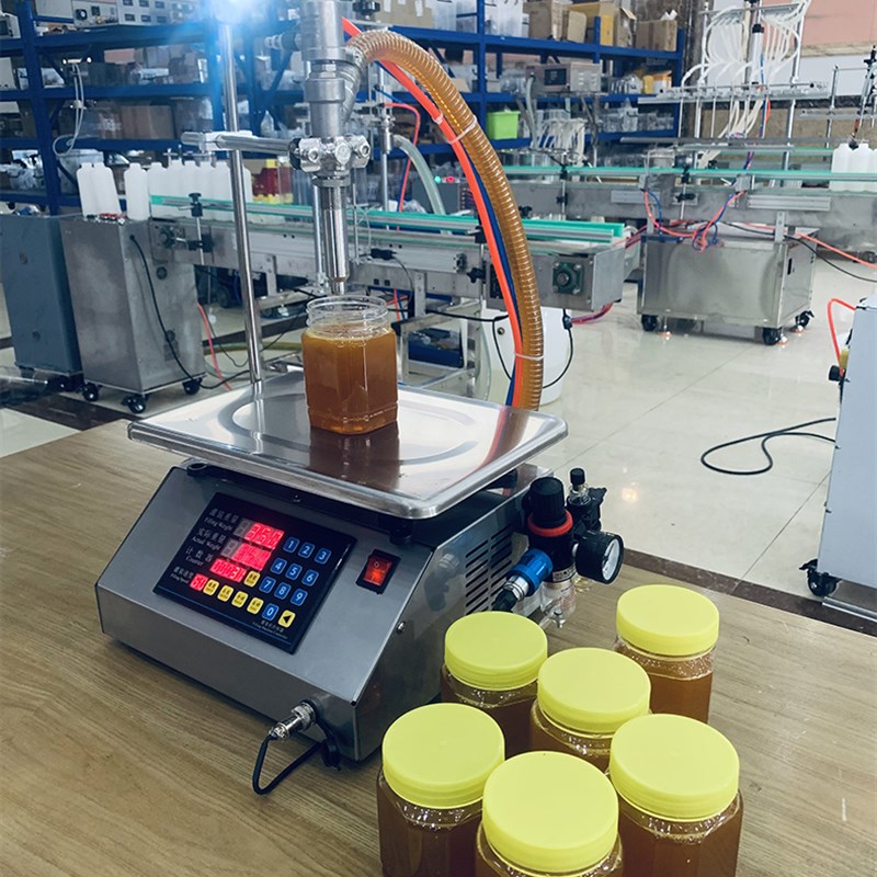 气动嘴真正防滴漏全自动芝麻酱蜂蜜称重定量分装机粘稠液体灌装机