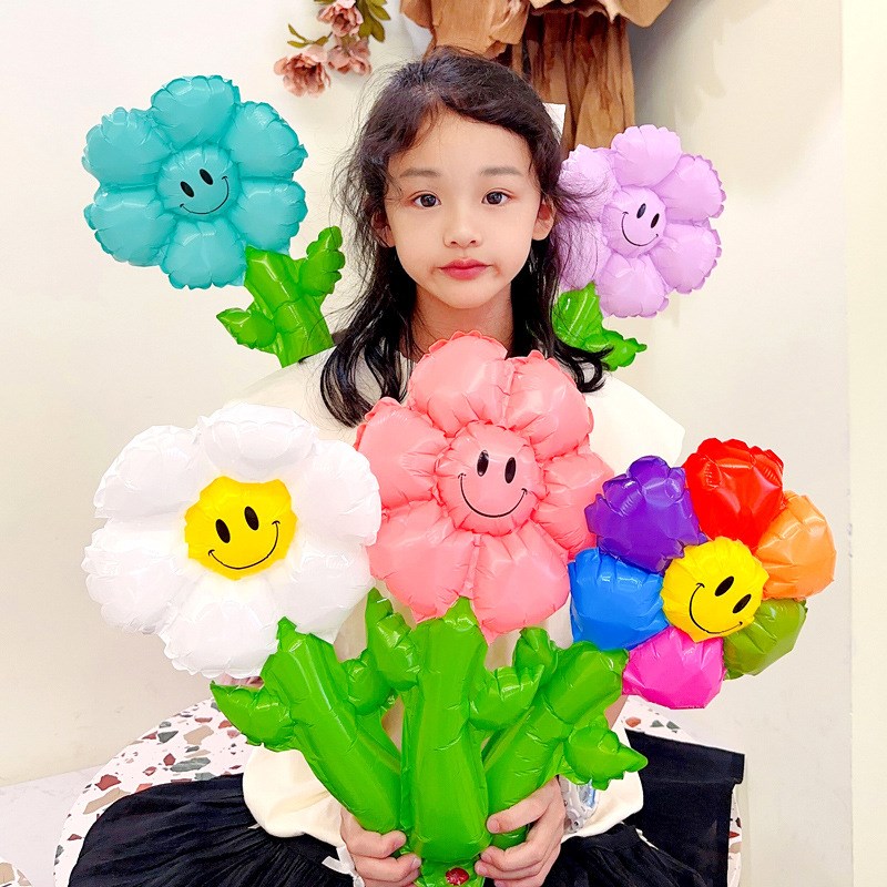 手持笑脸小雏菊花朵幼儿园开学校拍照道具气球太装饰教室布置