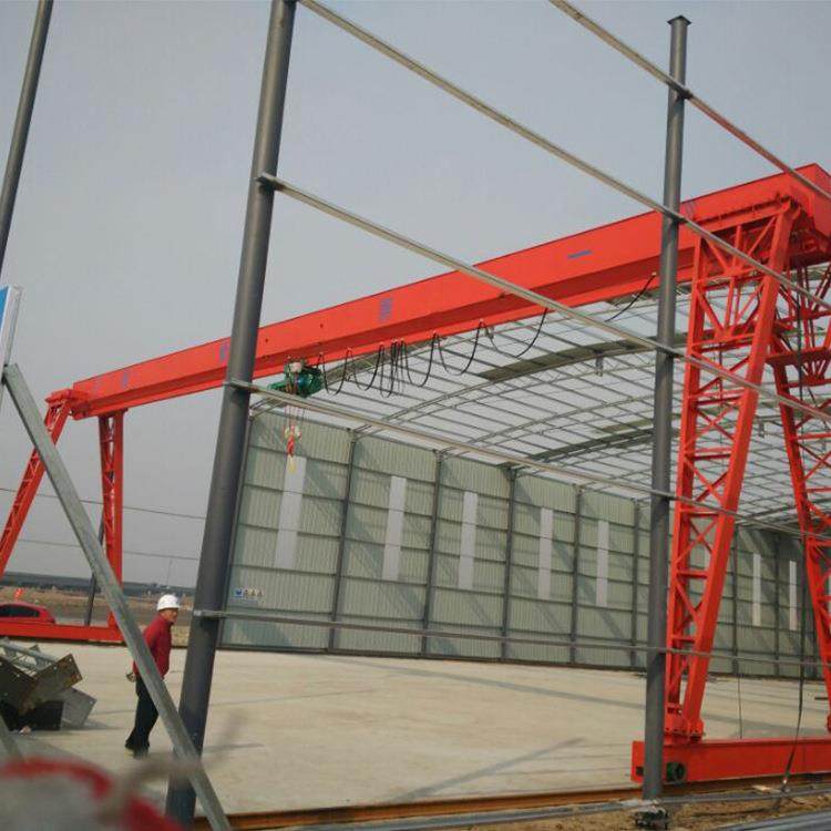 25吨跨度25米上包下花龙门吊主梁栓接方便运输需要的联系旧龙门吊