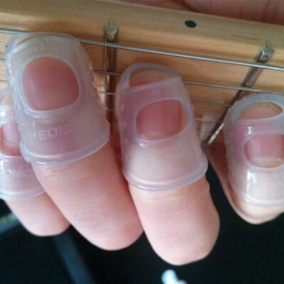 4pcs guitar picks fingertip Finger Thumb Picks Plectrums She