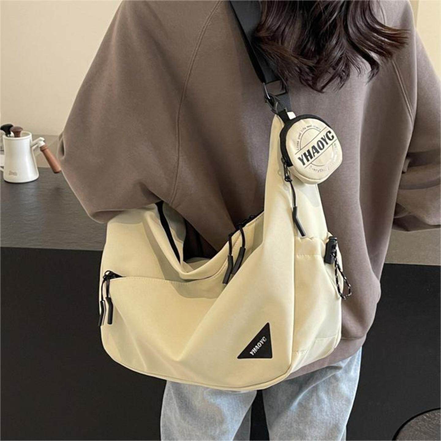 大容量帆布包包女士2026新款百搭休闲简约饺子包高级感潮流斜挎包