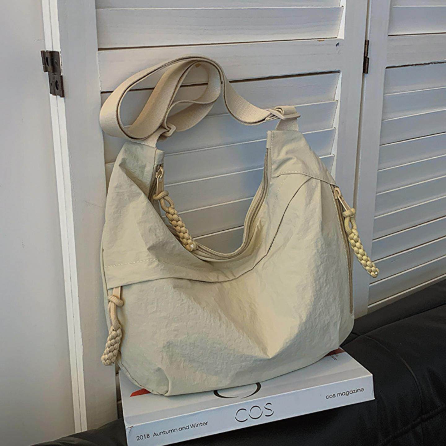 饺包女斜挎包大容量通勤包2024新款包包单肩运动百搭背包饺子包女