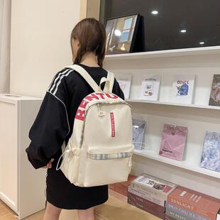 初高中大学生书包简约大容量双肩包批发休闲旅行背包透气透气轻盈