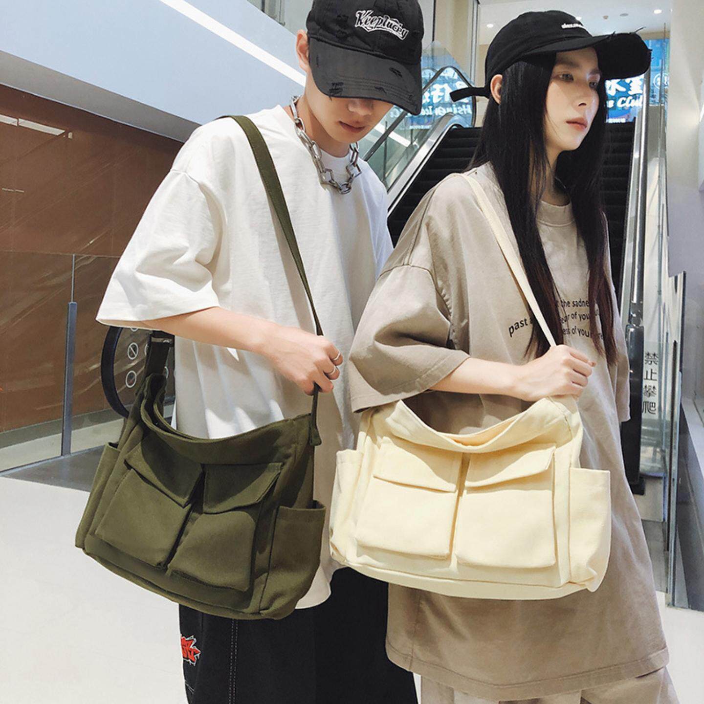 工装风大容量帆布包简约休闲旅行单肩斜挎包男女款街头潮流邮差包