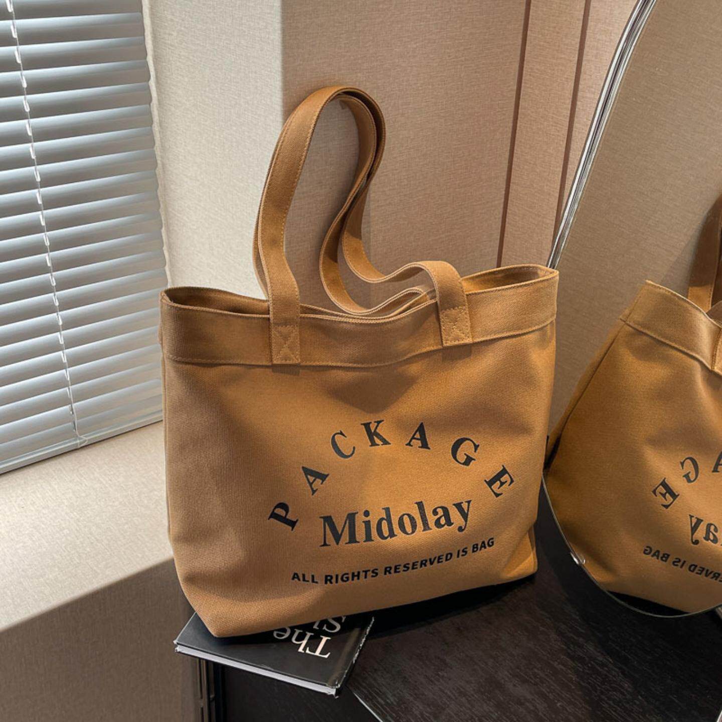 休闲简约大容量帆布包2024新款时尚日系手提妈咪包学生通勤托特包