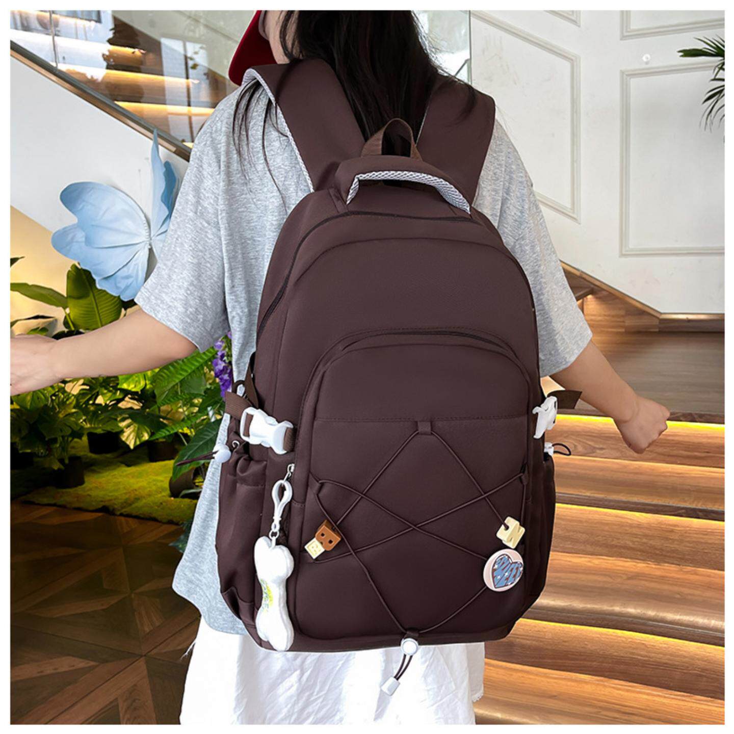 学生双肩包女高级感大容量设计感小众轻便背包高中女生质感书包