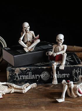 跨境新品创意骷髅人物看书摆件家居拍摄道具万圣节酒吧氛围装饰品