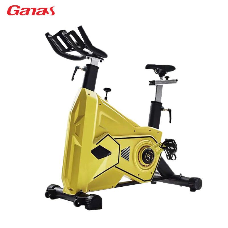 工厂新款动感单车健身房商用全包壳大飞轮动感单车健身自行车