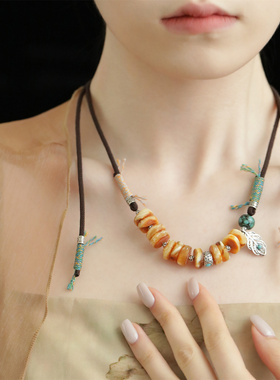 S925银蜜蜡松石肌理圈羽毛深棕色绳抽拉项链 N16109