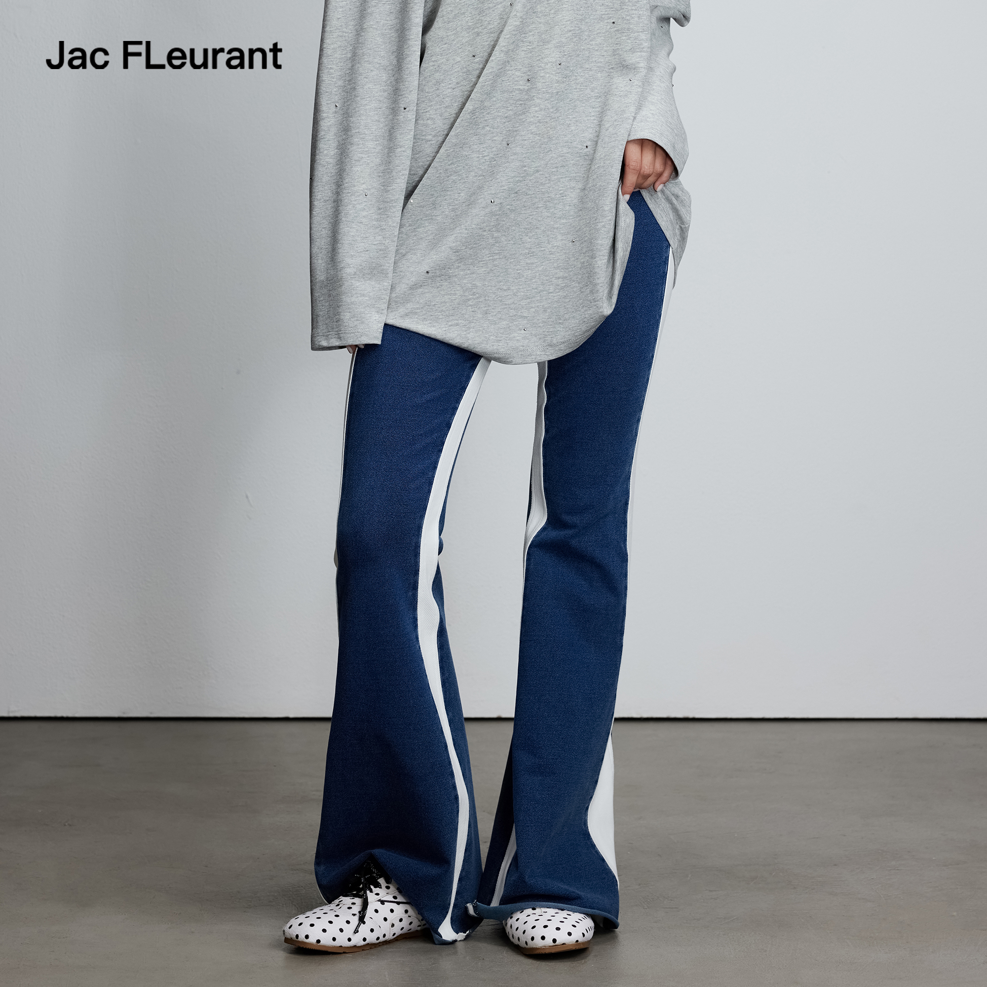 JAC FLEURANT2025秋季新品蓝色侧边白条弹力针织微喇牛仔裤显瘦