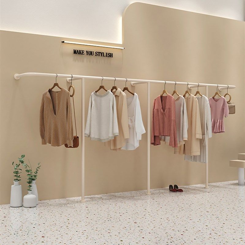 女装店货架展示架落地式上墙壁挂式不锈钢奶白色挂衣架服装陈列架