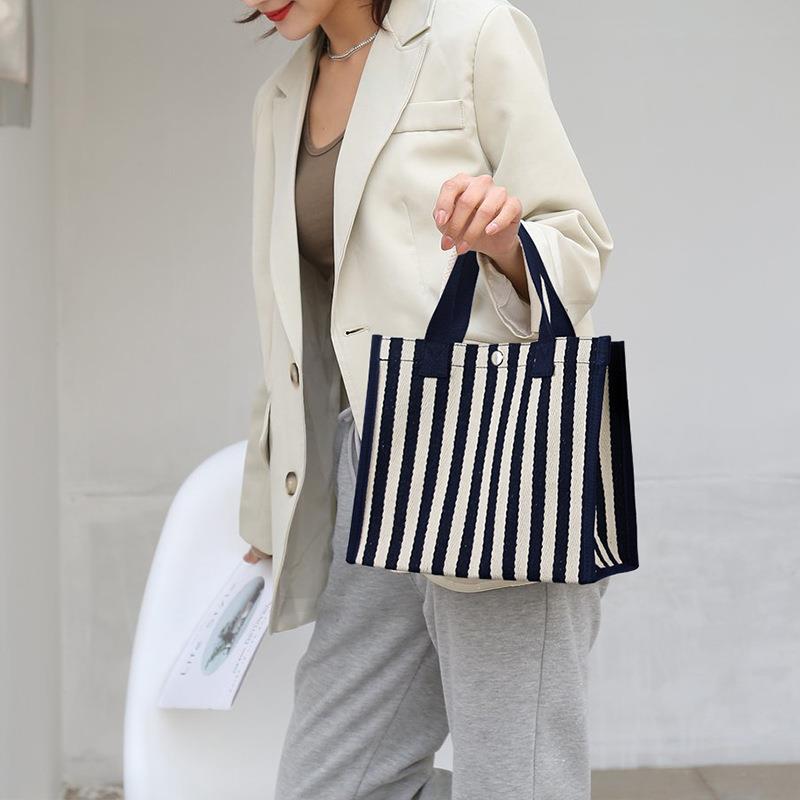 新款直销手提袋帆布袋子环保便当盒上班族带饭盒装饭盒兜手拎包超