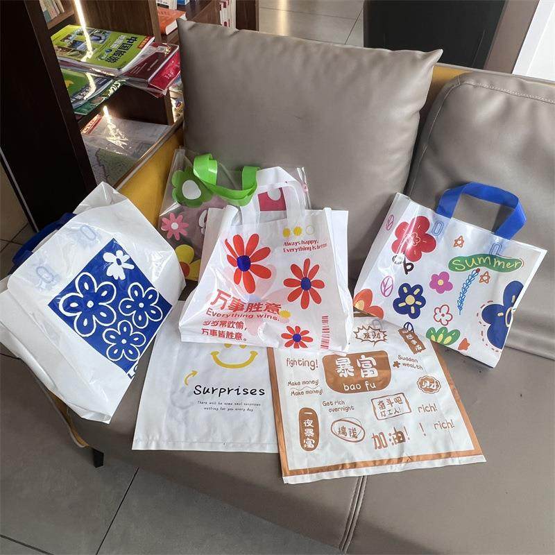 新款直销加厚塑料女装店服饰商用手提包装购物袋子礼品手拎兜高档