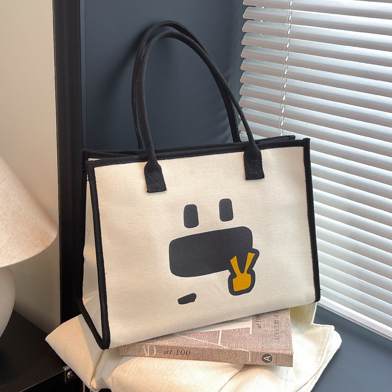 大容量帆布包女2025新款可爱卡通单肩托特包妈咪包外出旅行手提袋