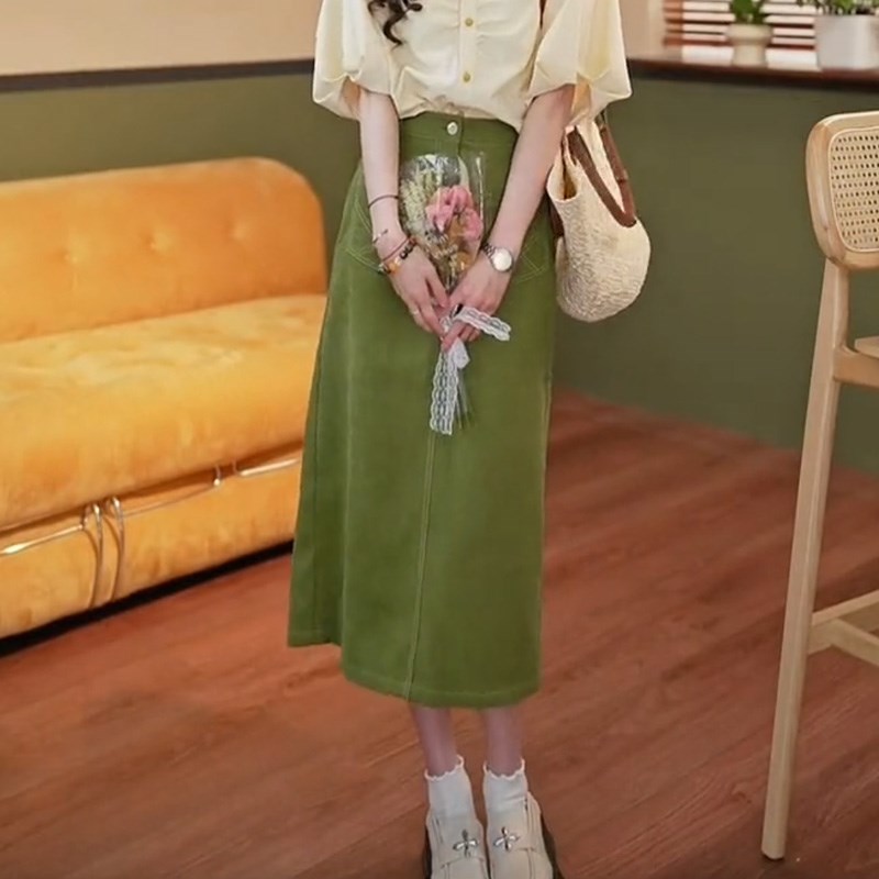 复古港风绿色a字半身裙女夏季2025年新款高腰显瘦休闲直筒短裙子