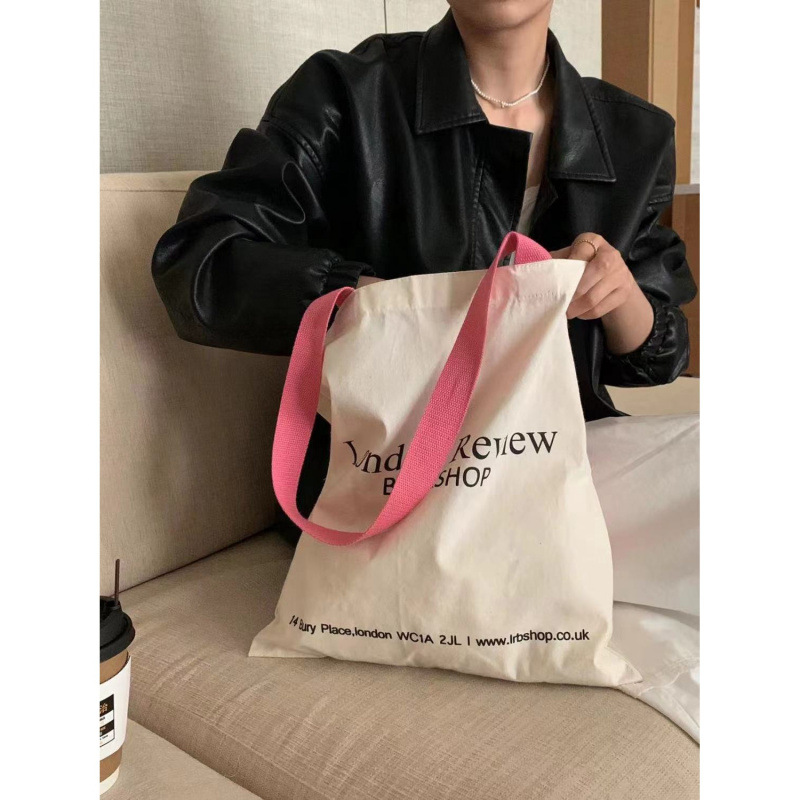 韩国粉色单肩帆布包女通勤复古帆布袋包包小众慵懒风手提袋ins
