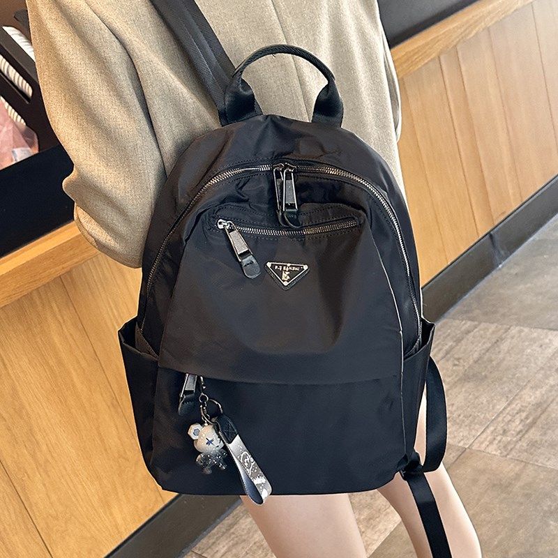 2025新款轻便高颜值旅游双肩包女通勤牛津布大容量背包大学生书包