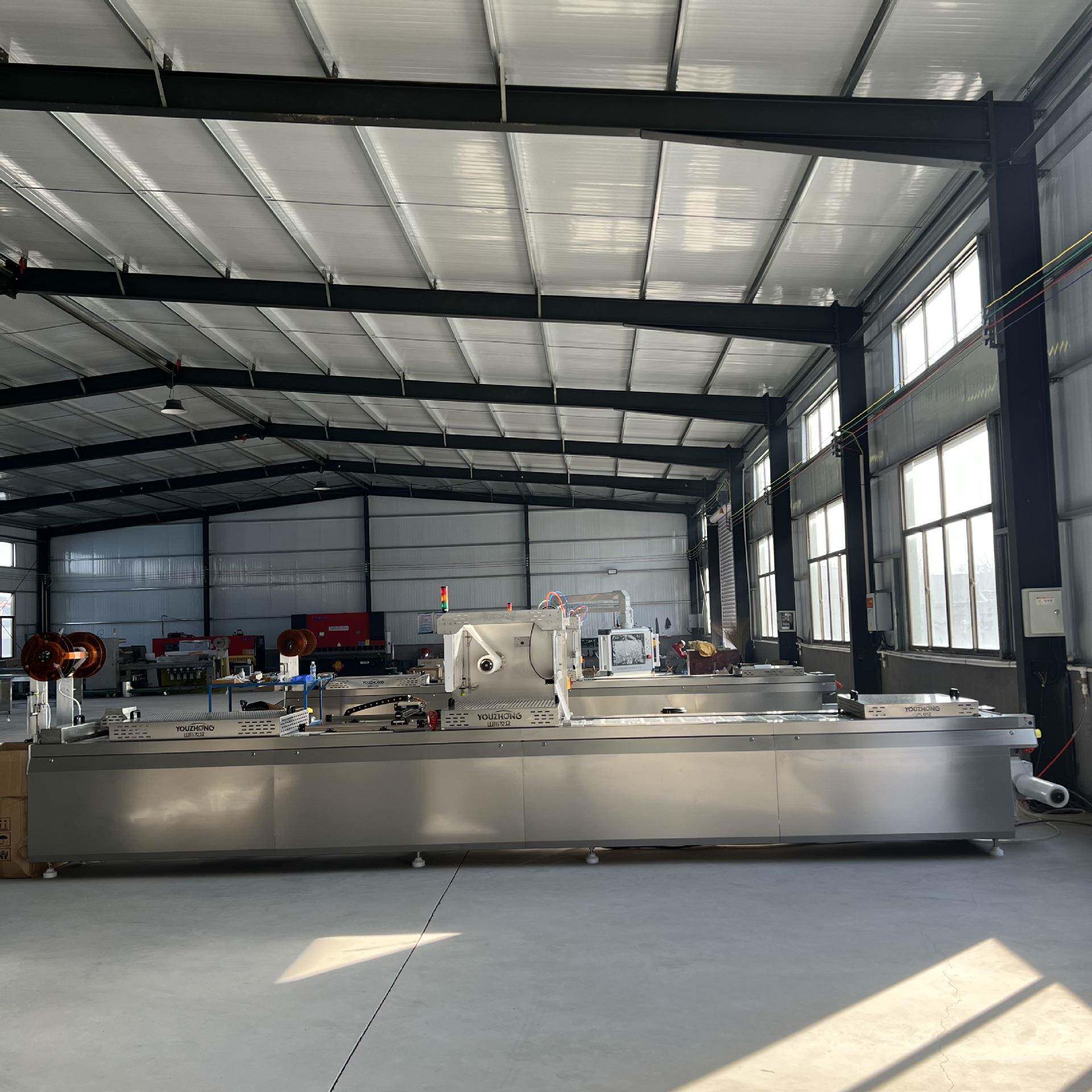 泡椒藕片鱿鱼仔拉伸膜真空包装机扇贝肉小海鲜零食连续式真空包装