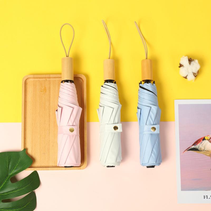 直销新款简约实木手柄黑胶遮阳伞三折太阳伞2020新款雨伞印制logo