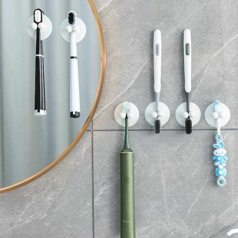 直销新款吸盘壁挂式牙刷架免打孔简易款牙刷架电动牙刷架多次重复
