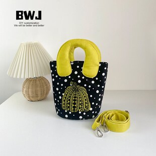 艺术家草间弥生波点o南瓜日系手提斜挎圆底水桶包包环保布袋怪婆