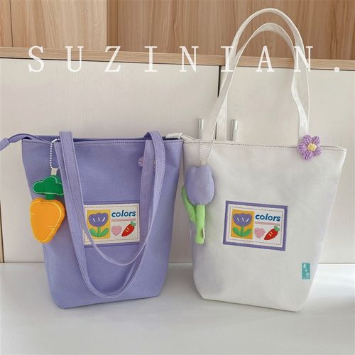 小众设计感简约可爱手提帆布包女水桶包文艺通勤上班族肩帆布袋