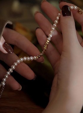 天然淡水珍珠手链叠戴新款女轻奢小众设计双层高级感小碎金手串冬