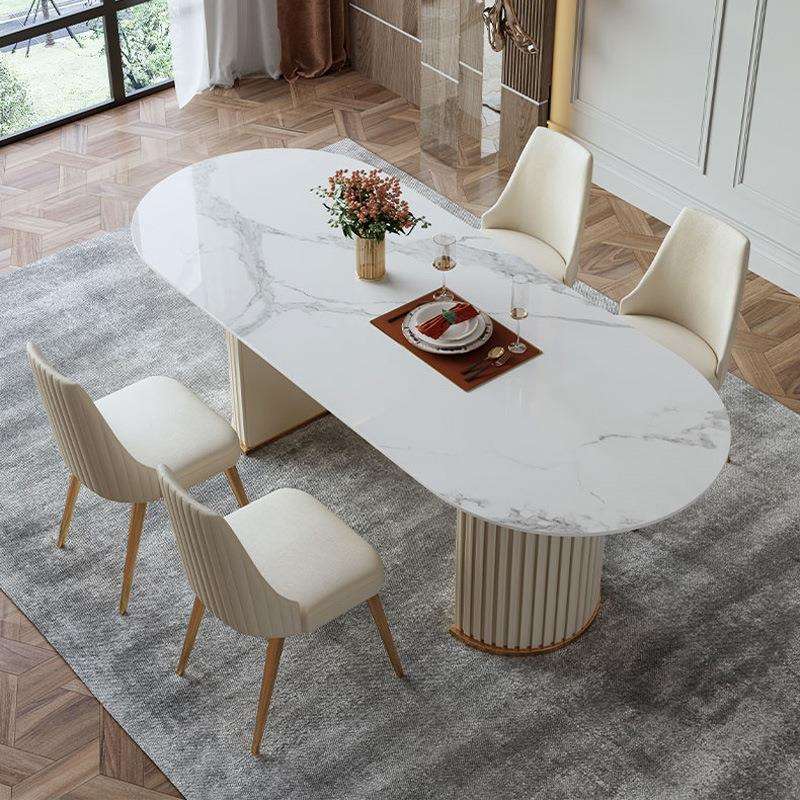 设计师轻奢亮光岩板餐桌长方形现代简约异形圆餐桌椅子组合