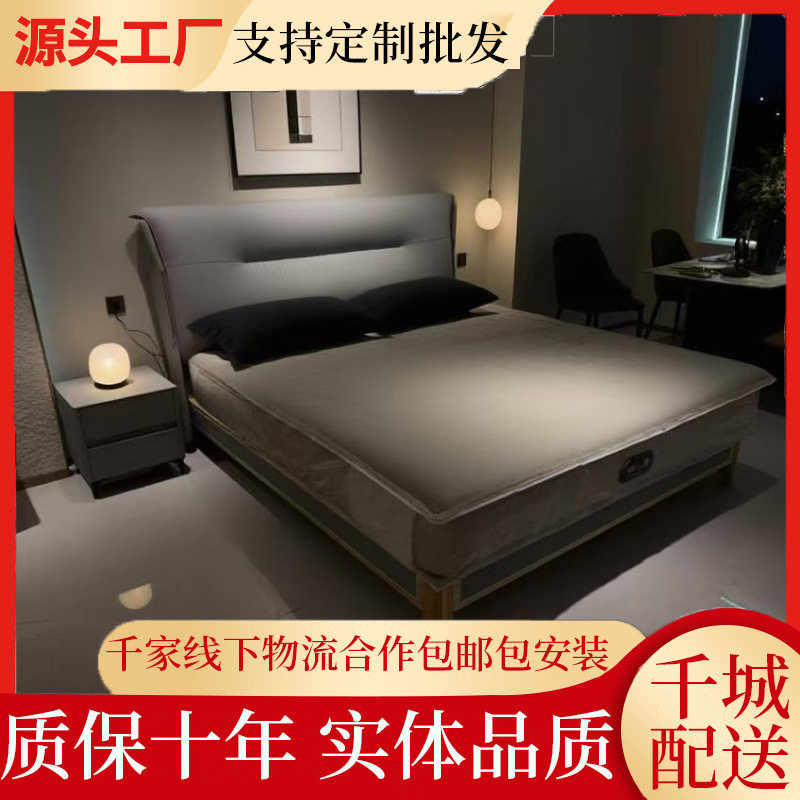 现代简约意式真皮床复古黑色泡芙床主卧高端大气1米8双人储物婚床