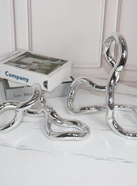 现代轻奢电视柜摆件家居客厅创意银色缠绕环形摆设样板间软装饰品