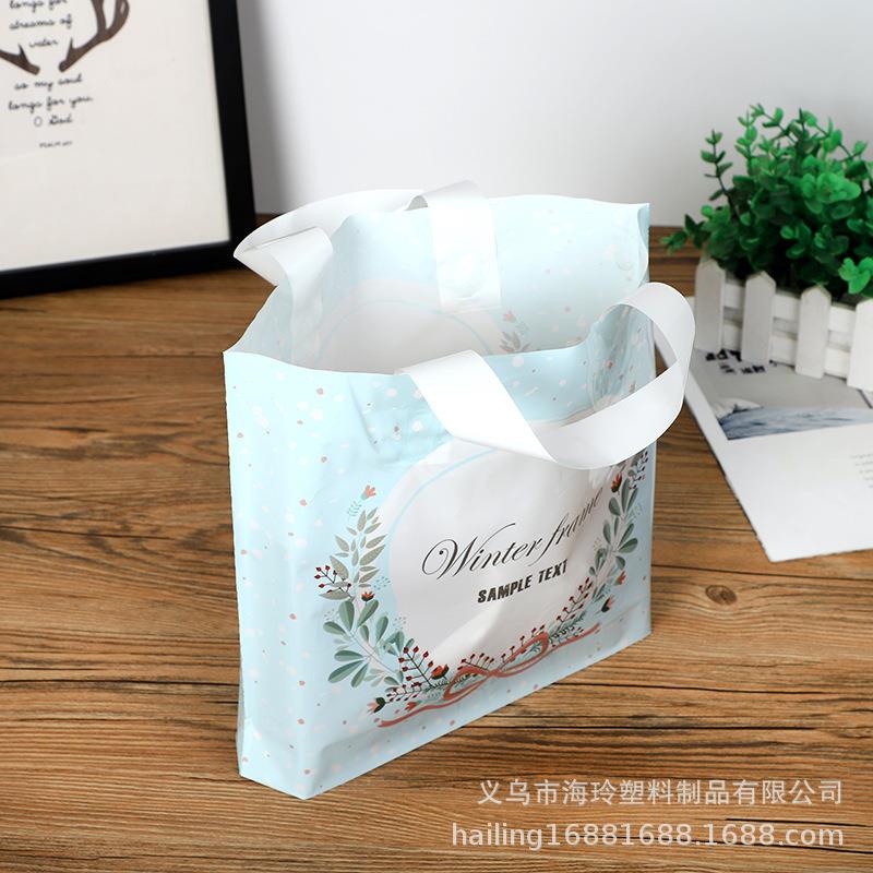 直销新款加厚新款塑料手提袋 服装店袋子 礼品包装购物胶袋 加印L