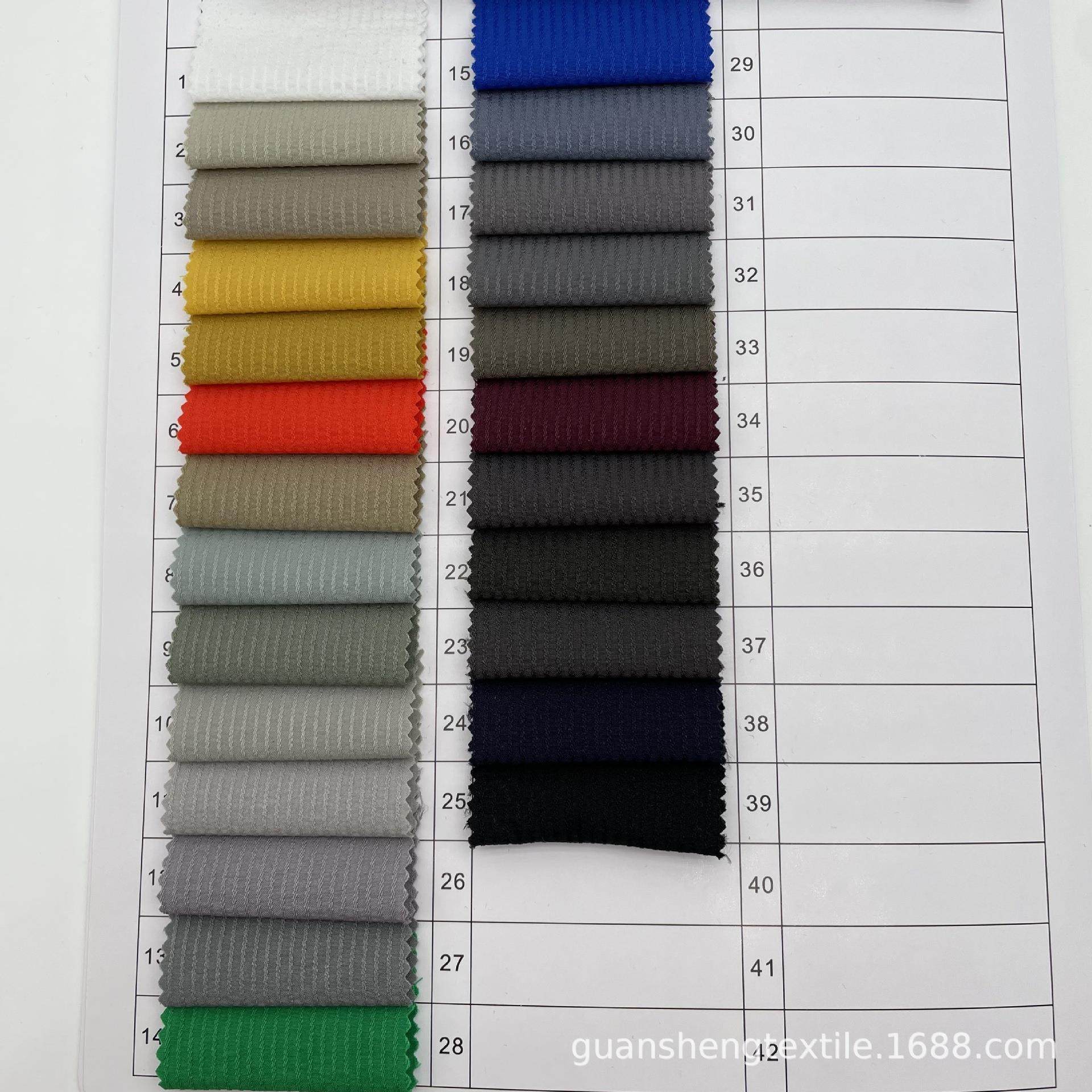 吸湿排汗速干运动休闲服面料 提花坑条尼龙四面弹条纹弹力面料