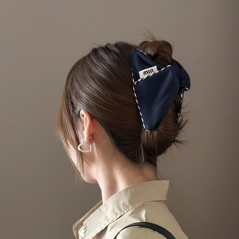 藏蓝布艺饺子抓夹女高级感