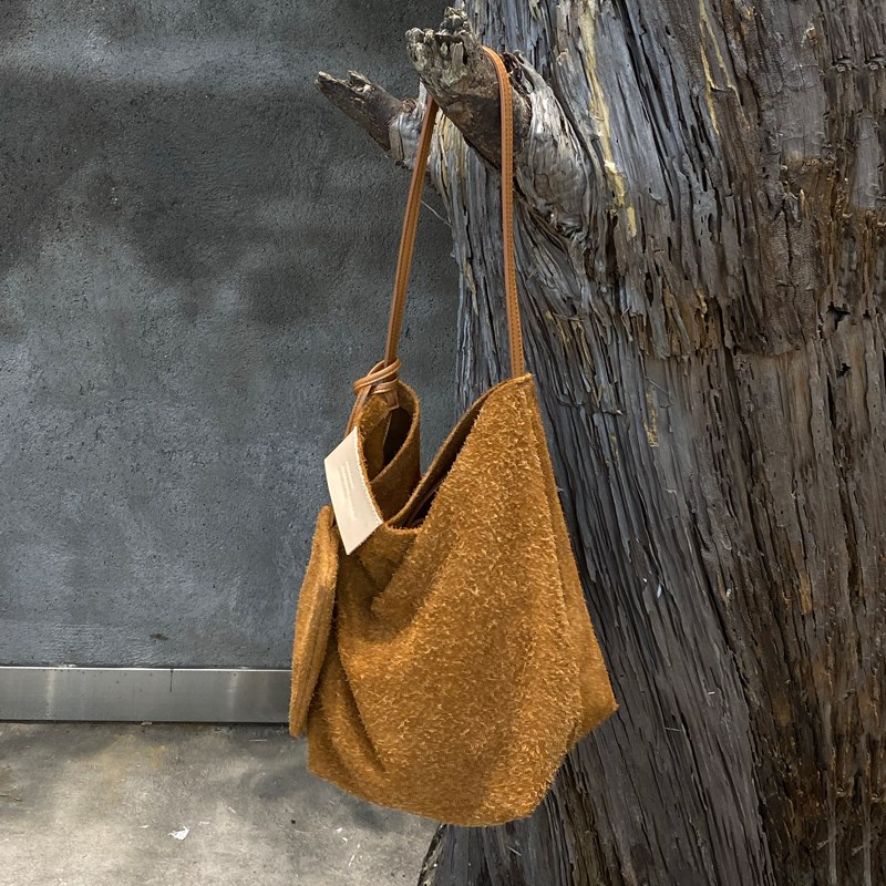 真皮手提包头层牛皮水桶包女2025新款小众大容量单肩斜挎通勤包女