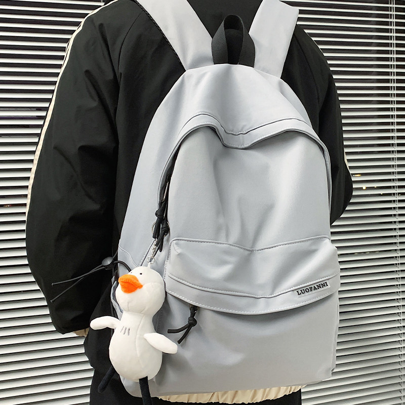 书包男生初中生双肩包2025新款轻便简约高中生大学生背包女电脑包