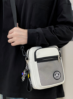 潮牌男士斜挎包新款时尚单肩包女手机包外出便捷休闲帆布包小背包