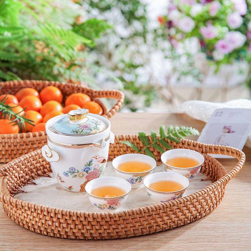 高档盖碗旅行茶具套装便携包户外潮汕功夫骨瓷过滤杯一壶四杯图片