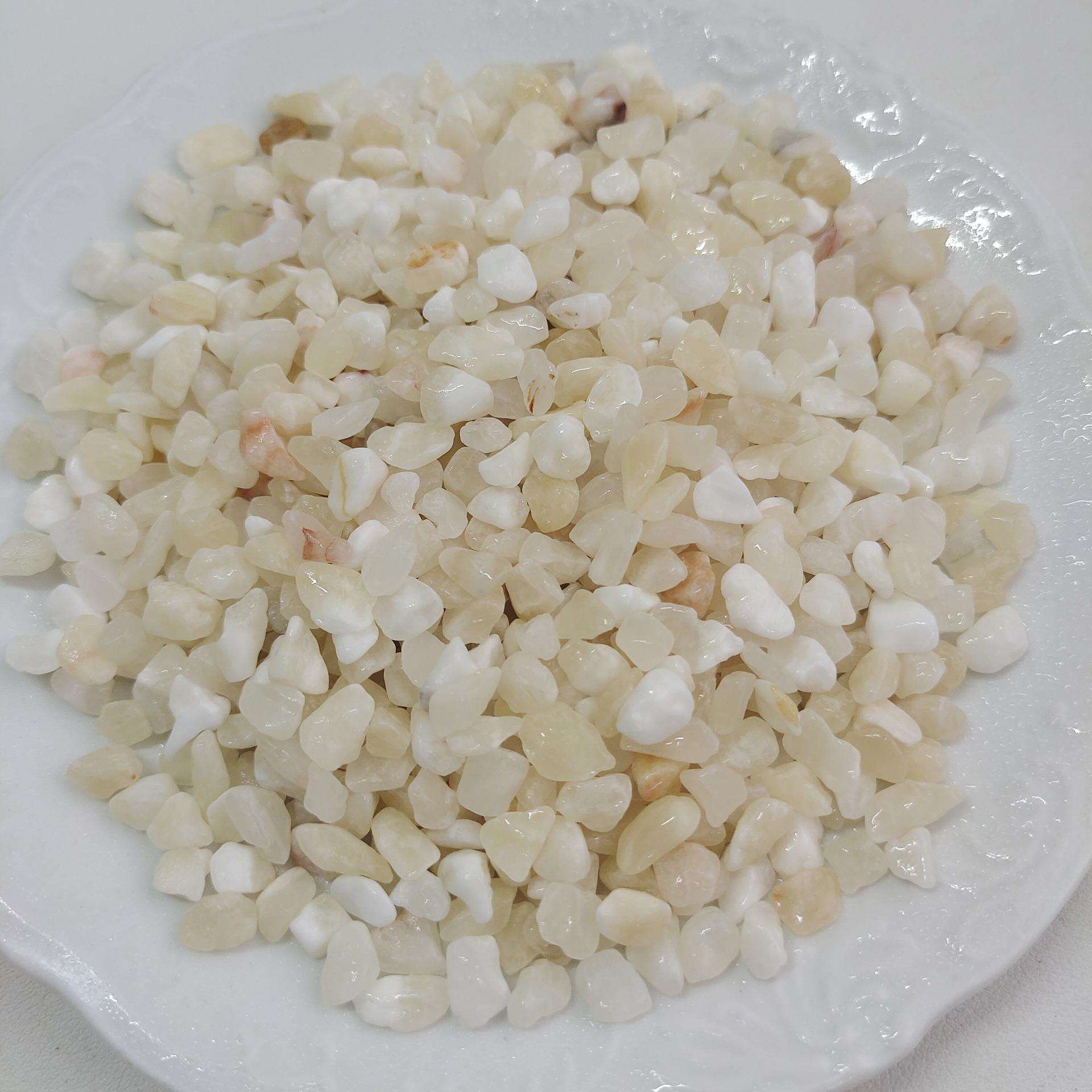 米黄玉卵石米黄石子铺路面用水洗石洗米石黄天然石铺路石